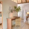bedroom_and_desk_area_in_the_luxury_family_suites_at_river_lodge_-_2020_